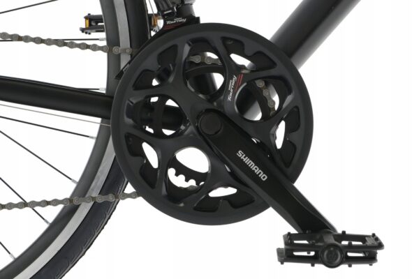 Cykelpedal och kedja av märket Shimano.