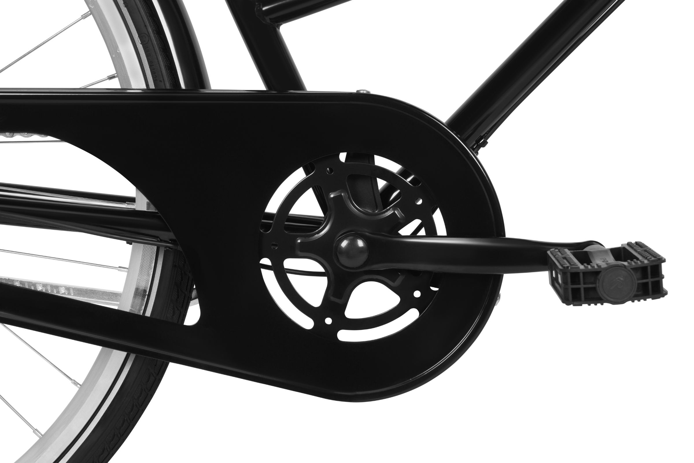 Närbild av svart cykelkedjeskydd och pedal