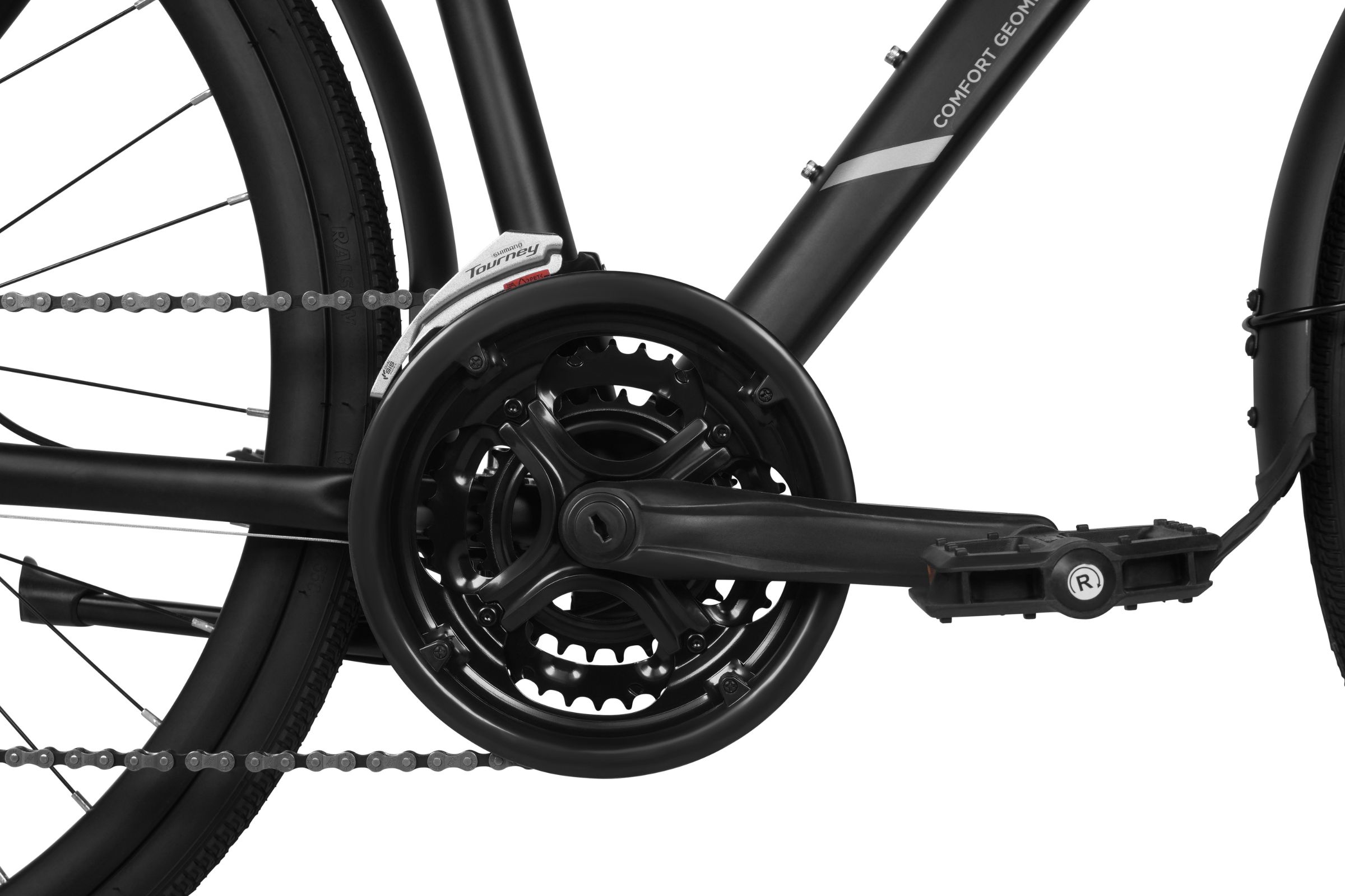 Cykelns pedal och växelsystem i närbild.