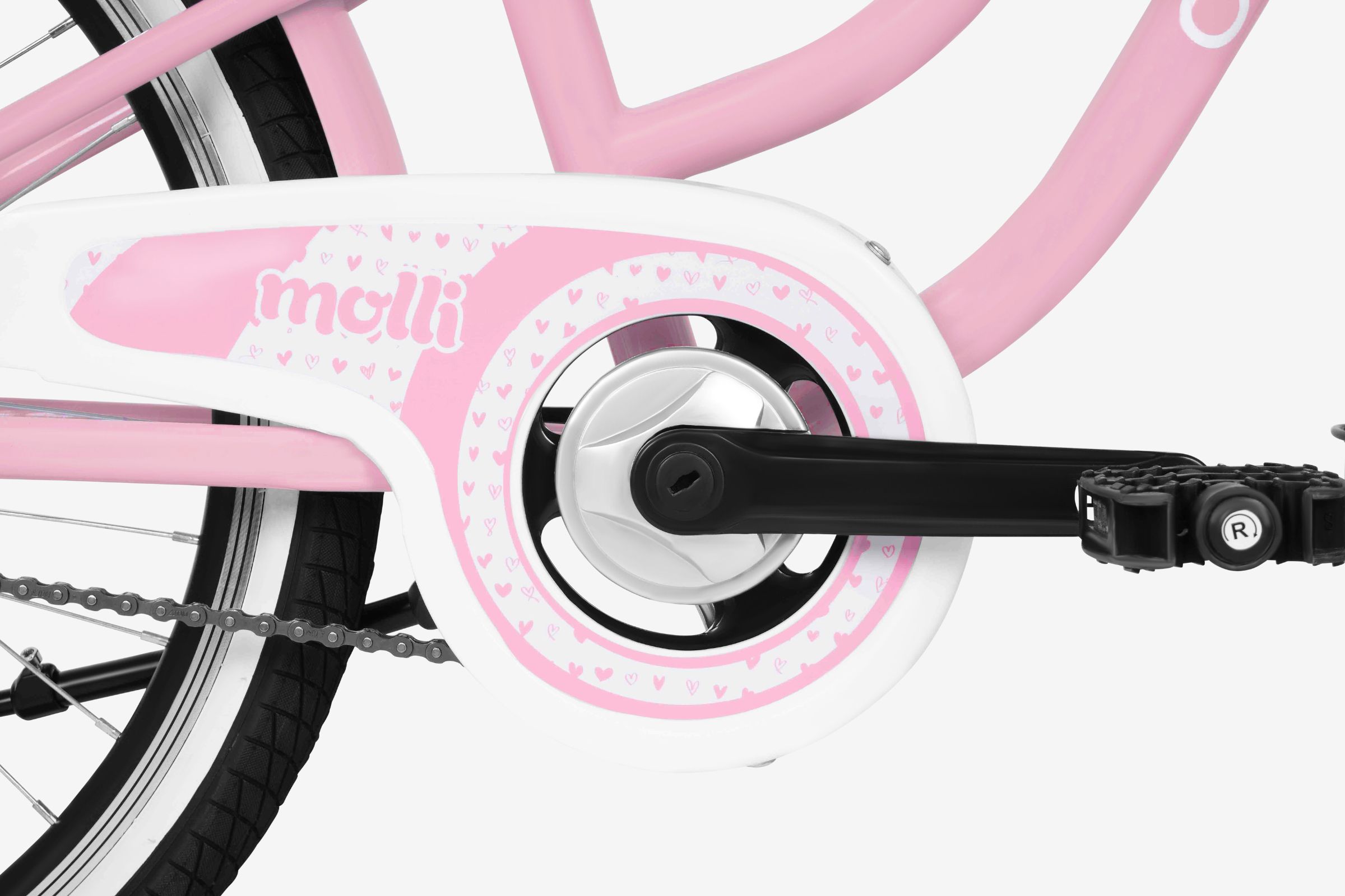 Rosa cykelpedal med hjärtformad design