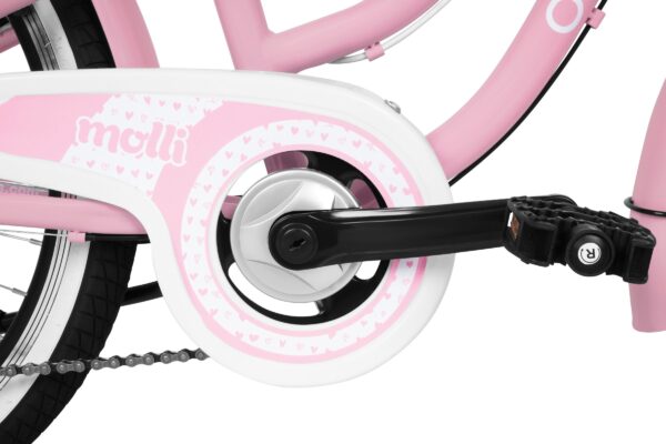 Rosa cykel med dekorativa detaljer.