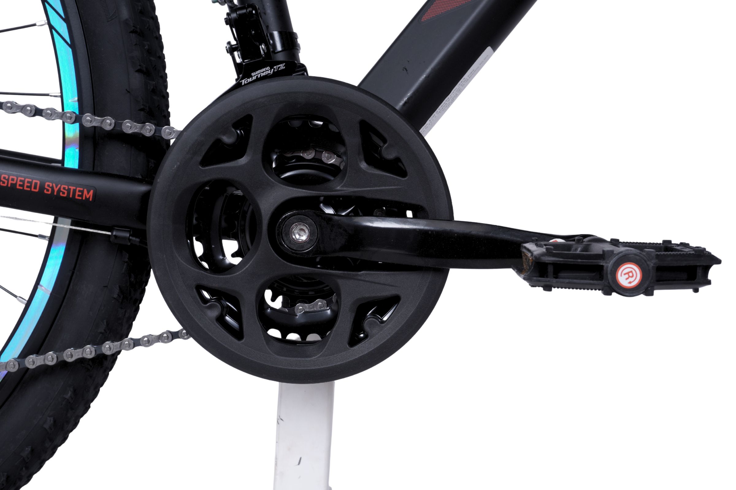 Cykelns vevparti och pedaler i detalj.